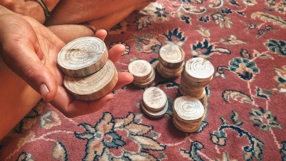 Wooden coins that represent the value to share